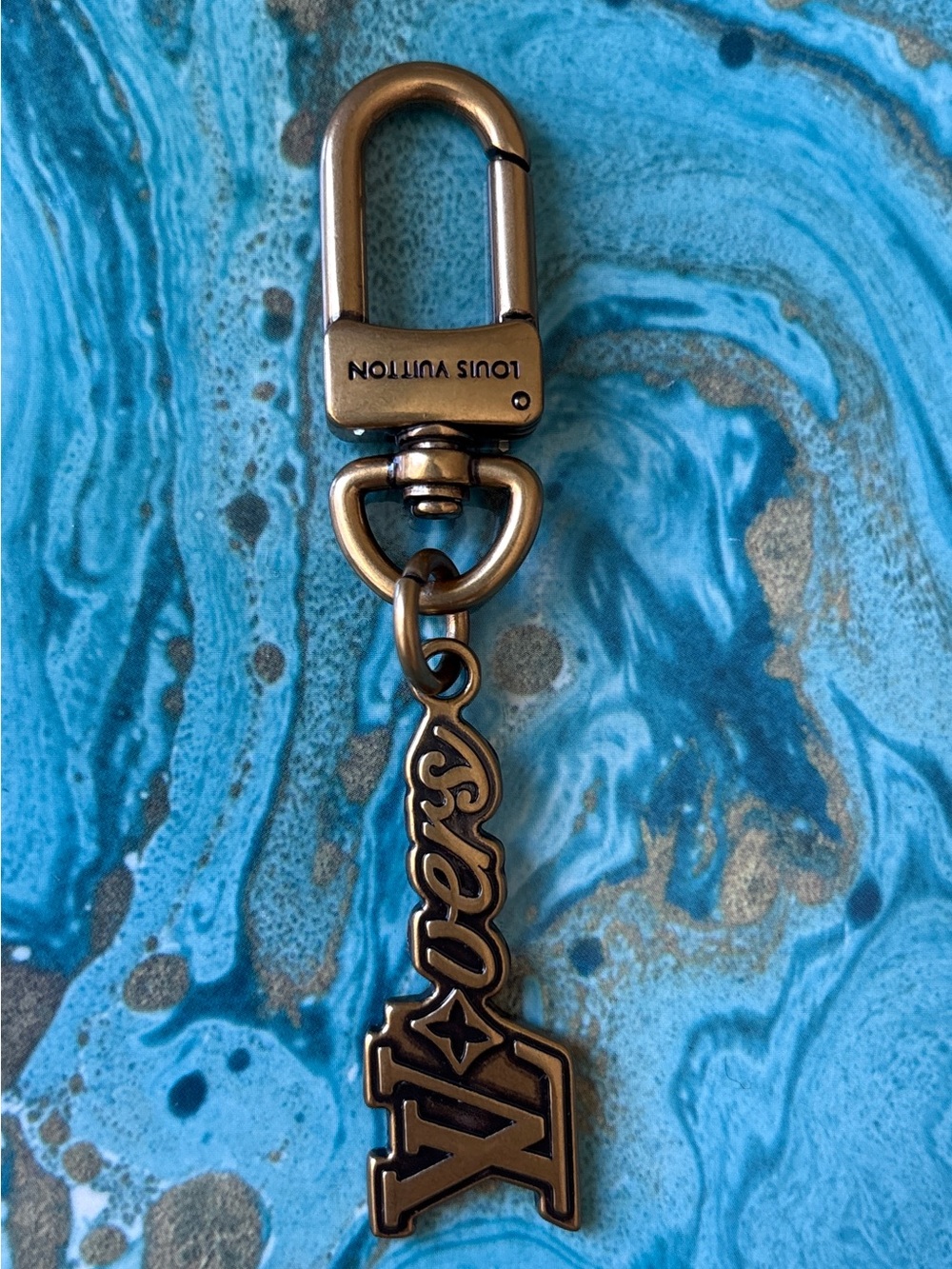 Louis Vuitton Bronze and Gold-tone LV Script Charm Keyring